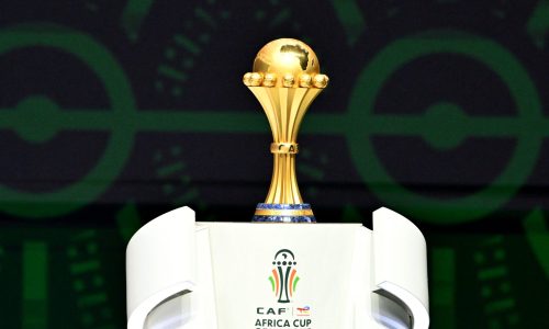 The trophy of the Africa Cup of Nations (CAN) is pictured on the stage during the CAN 2024 official draw at Parc des Expositions in Abidjan, southeastern Ivory Coast, on October 12, 2023. (Photo by Issouf SANOGO / AFP) (Photo by ISSOUF SANOGO/AFP via Getty Images)